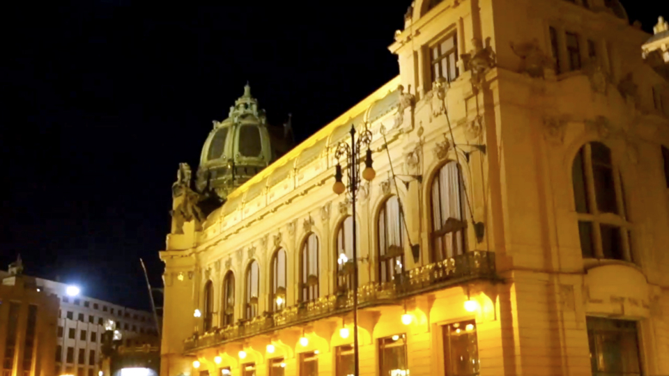 View of old buildings while nightwalking through Prague streets